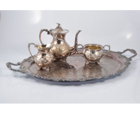 Pair of antique English silver sugar tongs; three other pairs of silver-plated sugar tongs; three plated decanter labels; fou