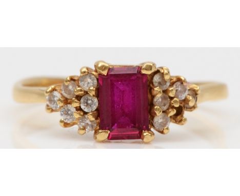 An 18ct gold synthetic ruby and white stone dress ring, K-L, 2.4gm. 