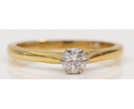 An 18ct gold single stone brilliant cut diamond dress ring, estimated weight .25, K, 2.1gm. 