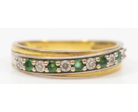 A 9ct gold emerald and eight cut diamond half eternity ring, R, 2.2gm. 