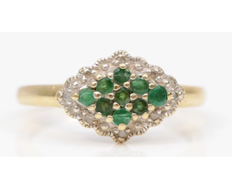 A 9ct gold emerald and eight cut diamond dress ring, Q, 2.4gm. 