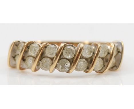 A 9ct gold seven row brilliant cut diamond dress ring, P, 3gm. 