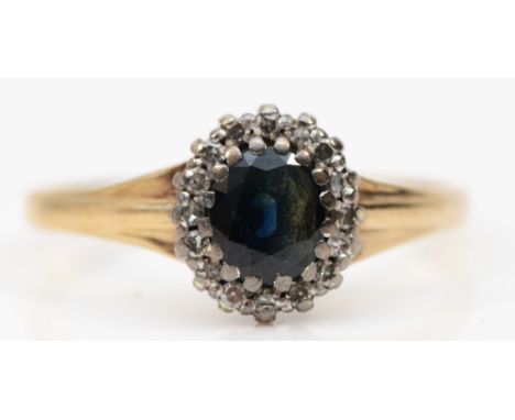 A 9ct gold sapphire and eight cut diamond cluster ring, Q, 2.1gm. 