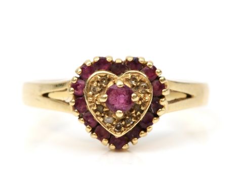 A 9ct gold ruby and eight cut diamond heart shaped cluster ring, S, 3.1gm. 