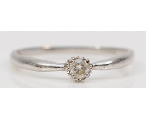 A 9ct white gold single stone brilliant cut diamond dress ring, N, 1.1gm. 