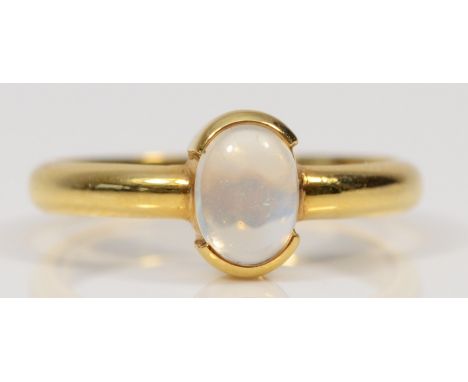 A 585 gold single stone moonstone dress ring, O, 2.9gm. 