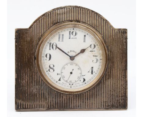 A George V silver mounted 8 day key less wind desk clock, by Walker &amp; Hall, Sheffield 1926, 10.5 x 9.5cm. 