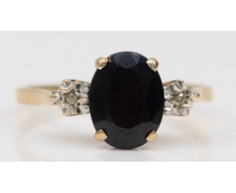 A 9ct gold sapphire and illusion set diamond dress ring, P, 1.7gm. 