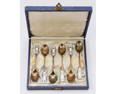 A set of six Danish sterling silver and enamel tea spoons, by Ela, 37gm, cased. 