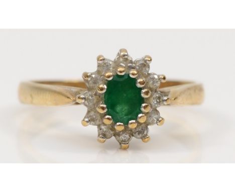 A 9ct gold emerald and eight cut diamond dress ring, L-M, 2.3gm. 