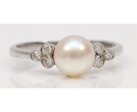 A 9ct white gold cultured pearl and brillaint cut diamond dress ring, P, 2.6gm. 