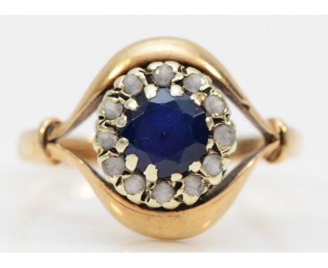 A 9ct gold blue and white paste stone cluster ring, R, 3.2gm. 