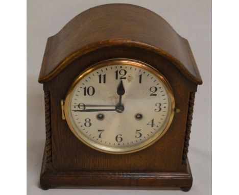 Early 20th century 8 day oak case mantel clock with barley twist corners &amp; a domed top