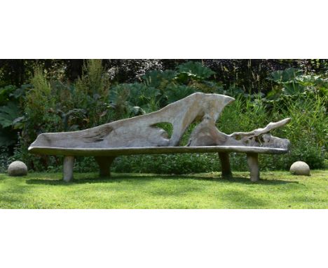 A LARGE ELM 'GROTTO' BENCH20TH CENTURYapproximately 106cm high, 293cm wideCondition Report: Heavy weathering consistent with 