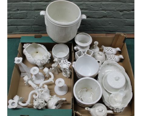 Two boxes of blanc de chine wares including a three branch candlestick etc
