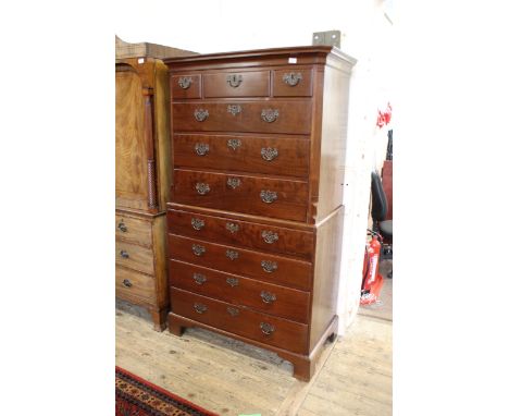 A George III mahogany chest on chest with fluted canted sides to upper section and fitted secretaire drawer, width 108cm x de