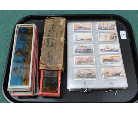 Various vintage magic lantern slides, one marked 'Primus' plus a selection of loose slides and various mainly sets of cigaret