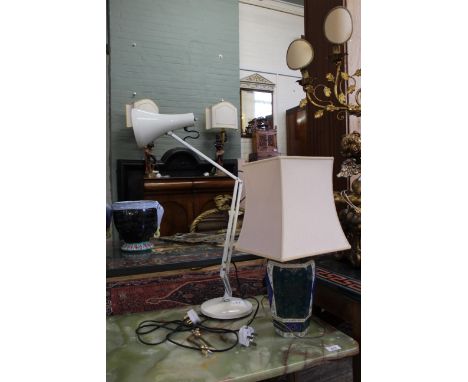 A cream coloured anglepoise lamp and a hexagonal porcelain vase converted to a table lamp