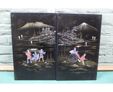 A pair of vintage Japanese wooden panels inlaid with painted mother of pearl, 28.5cm x 45cm