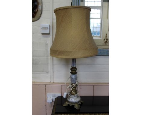 A brass mounted onyx table lamp