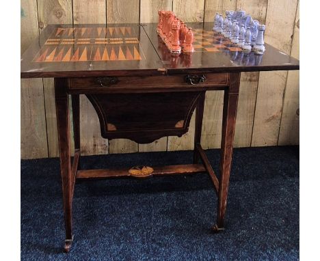 19th century Rosewood games table. Lift top section revealing chess board. Raised on tapered legs. Needs attention in areas. 