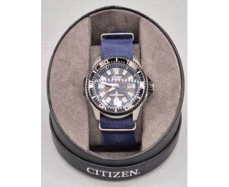 Citizen Eco- Drive Divers 300M Wristwatch with original box and Instruction manual. 