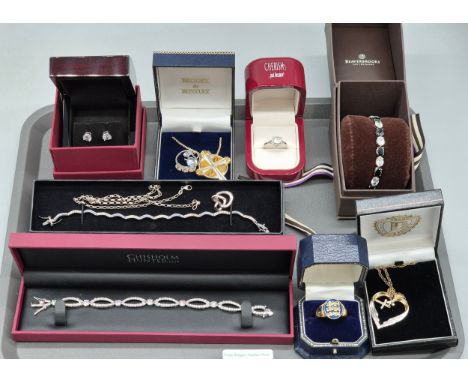 Collection of silver jewellery; Chisholm Hunter earrings and bracelet. Brooks &amp; Bentley cross pendant and chain. Beaverbr
