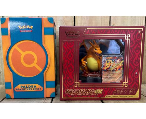 Pokemon Charizard EX Super-Premium Collection in box (packs inside have been opened. 3 Promotional cards included), along wit