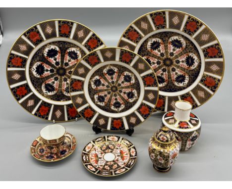 Collection of Royal Crown Derby; Two large plates, Smaller plate, Lidded preserve, vase and cup and saucer.