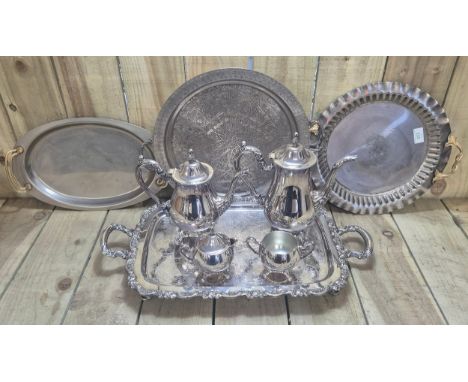 Silver plated tea/ coffee service and three various serving trays. 