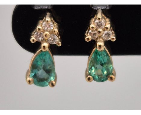 Pair of 9ct yellow gold, Green Tourmaline and diamond earrings.