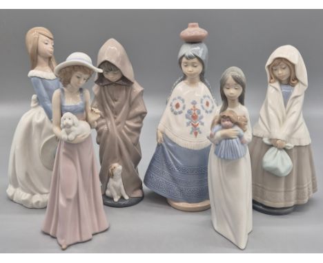 A Collection of Six Spanish pottery Nao Figurines, Boy and dog, girl and doll, girl and dog, girl with bag, girl with sun hat