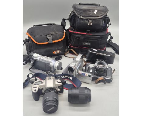 Selection of cameras and camcorders; Canon EOS500 with lenses and carry bag. Canon Digital Video Camcorder. 