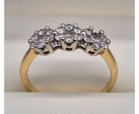 18ct yellow gold and diamond stone cluster ring. Triple daisy ring. Missing one stone. Under 1ct diamonds. 3.60grams. 