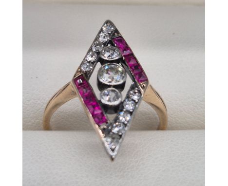 1920's Art Deco 18ct yellow gold, diamond and ruby stone ring. Three round cut centre diamonds, diamond shaped outer form hol