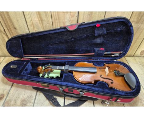 Stentor Violin with bow in fitted travel case. 