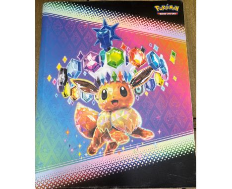 Pokemon Prismatic Evolution folder with mixed evolution cards. 