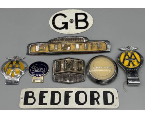 Selection of various car badges; Bedford badge, various AA badges, Austin badge, BMC Diesel Badge, Riley Badge and Leyland ba