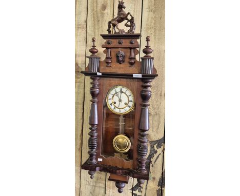 Victorian Vienna wall clock with unicorn finial top with key &amp; Pendulum . just had service. In a working condition. 92cm 