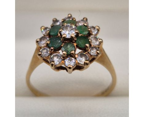 9ct yellow gold, emerald and CZ cluster ring. 2.48Grams. Ring size P.