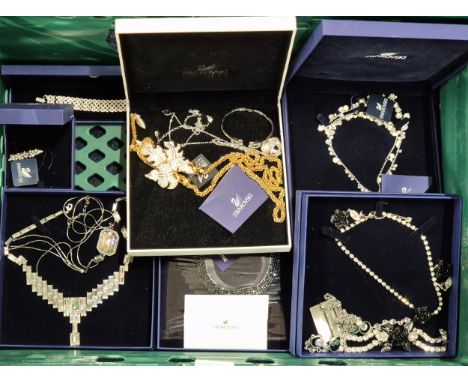 Crate of Swarovski Crystal Jewellery; Necklaces, brooch, bangle, bracelet and other items.