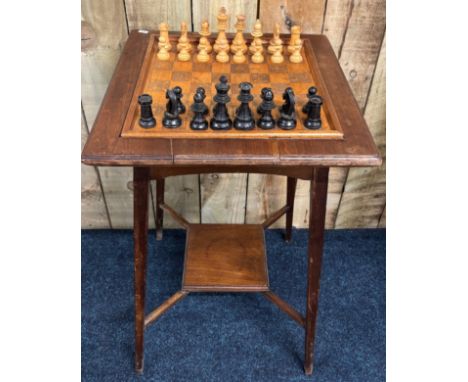 Arts and crafts carved chess table. Comes with chess piece- one missing. 73x45.5x45.5cm