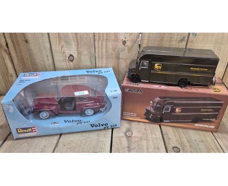 Two boxed Truck and car models; Volvo PV544  and UPS van. 