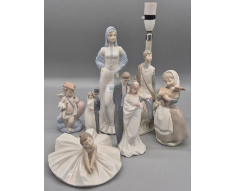 Collection  of Spanish Porcelain Figurines; Nao Man sitting lamp, Nao groom and bride, Nao girl with lamb, Nao cherub, Nao ba