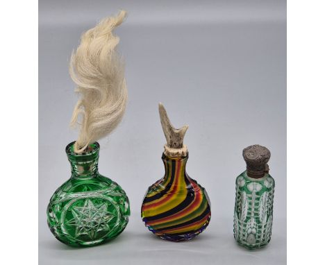 Antique perfume bottles; Multi coloured perfume bottle encased in clear glass- Facet cut. Single green and glass overlay perf