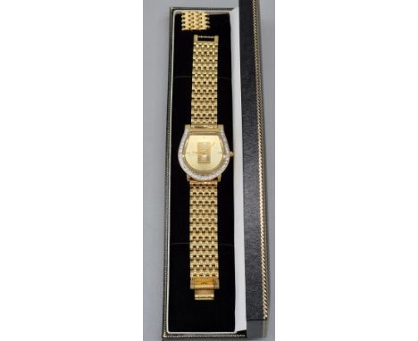 Brooks &amp; Bentley Gent's gold plated horse shoe shaped wrist watch. Fitted with a 999.9 fine gold ingot. 