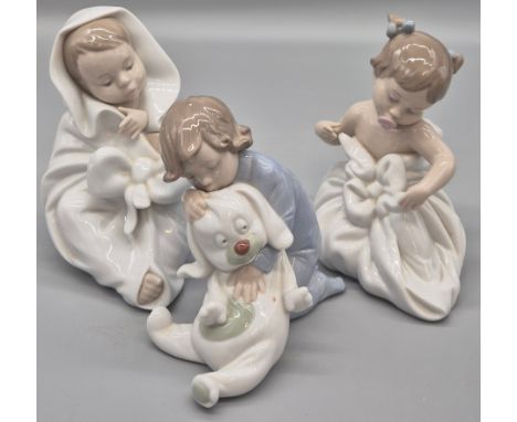 Three Spanish Porcelain by Nao Baby figurines. 
