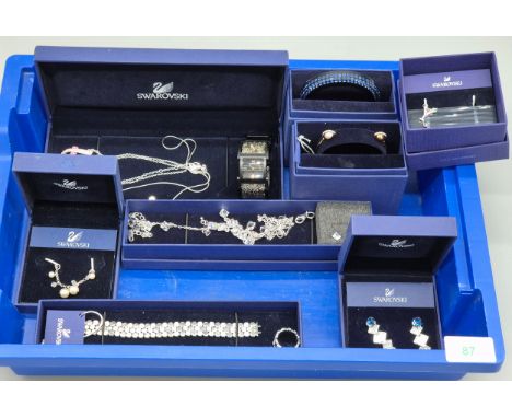 Collection of boxed Swarovski crystal jewellery; Loose Swarovski watch 5027136. Bracelets, bangles and earrings.