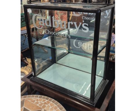 Antique shop counter display cabinet, Detailed with Cadbury's Chocolates to the front panel. 64x61x31cm.