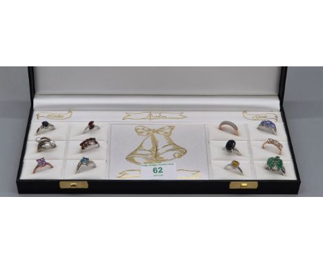 Eleven various 925 silver and gem stone rings; Emerald, garnet, Amethyst and pearl rings.